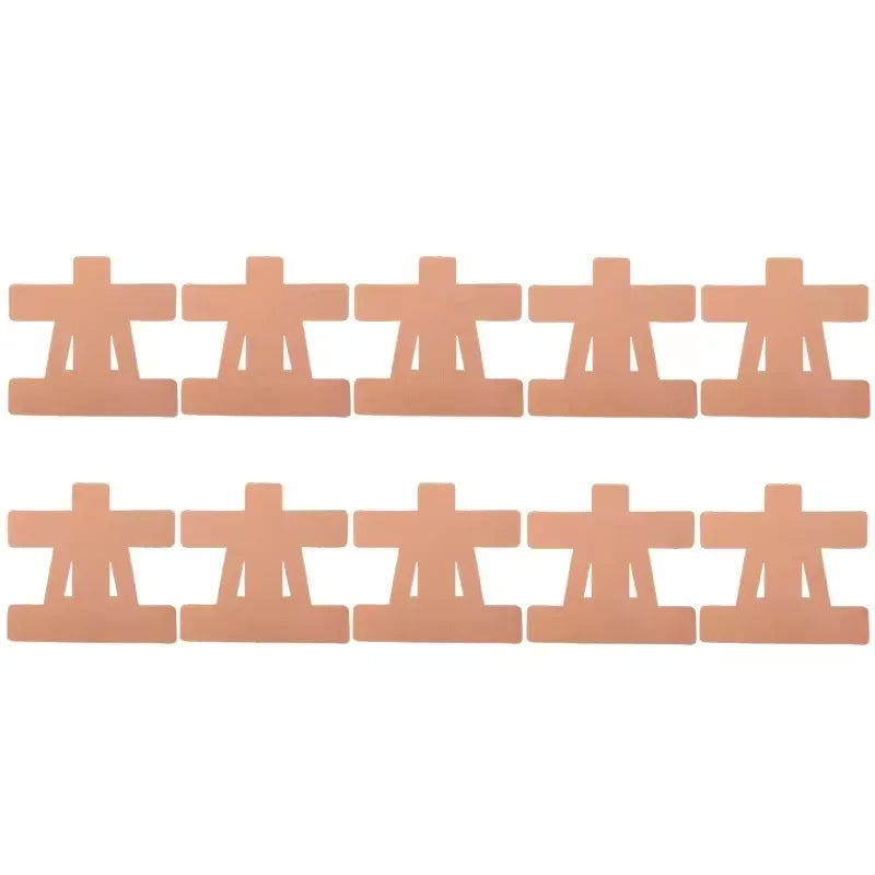 Eine Reihe vorgefertigter beige Kinesiologie-Tape-Streifen zur Linderung von Schulterschmerzen.