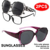 A set of two sunglasses is shown, including a pair with a leopard print frame and a pair with a purple frame.