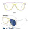 Front view of COL.3 photochromic square frame sunglasses showing the transition from clear to dark tint with UV400 protection
