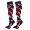 Pair of red and black checkered compression elastic socks for sports and daily wear
