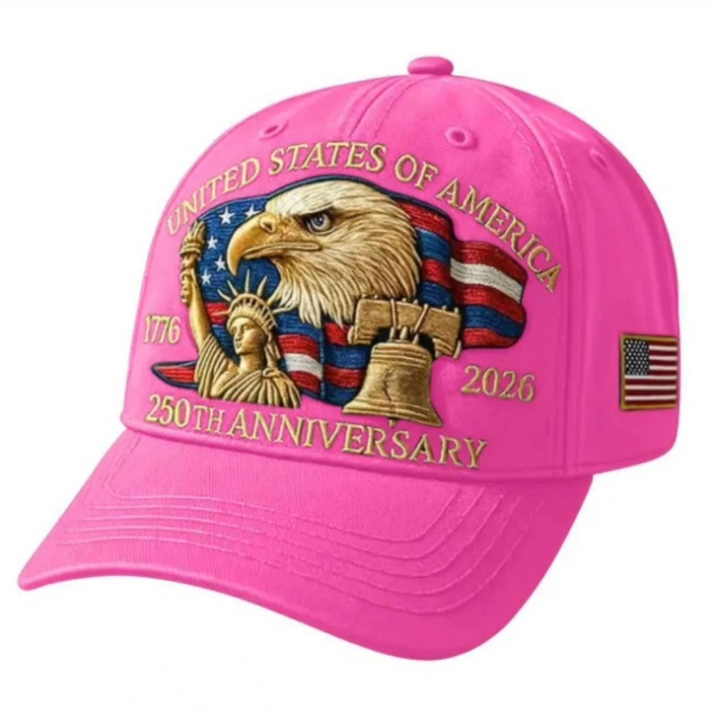 A bright pink baseball cap featuring a patriotic design with the text United States of America 1776 and 2026