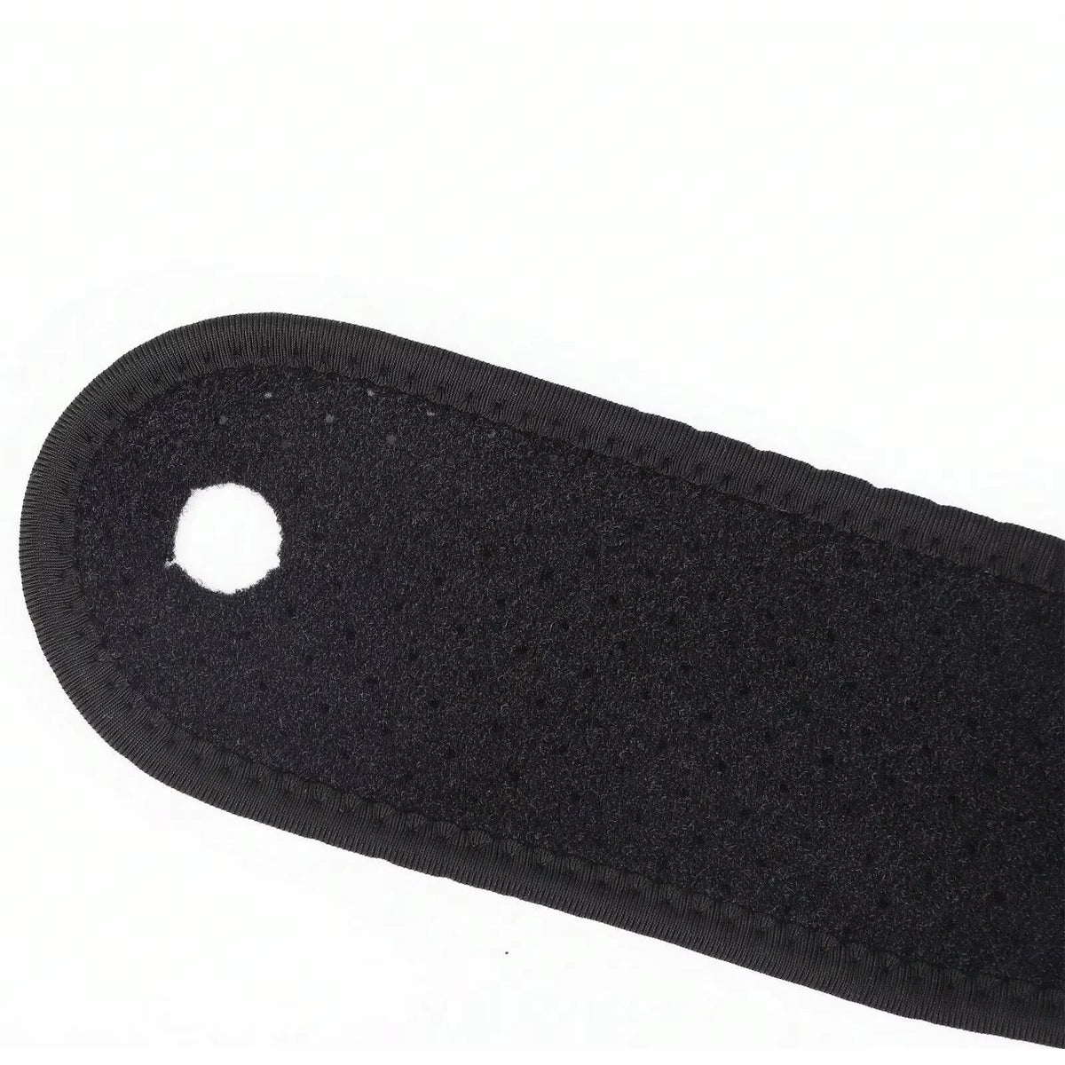 Black adjustable wrist support brace with a hole for adjustment