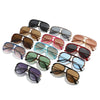 A collection of various retro pilot sunglasses in shades of brown, pink, silver, and black.