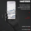 A hand wearing black touchscreen gloves is holding a smartphone displaying a mountain landscape.