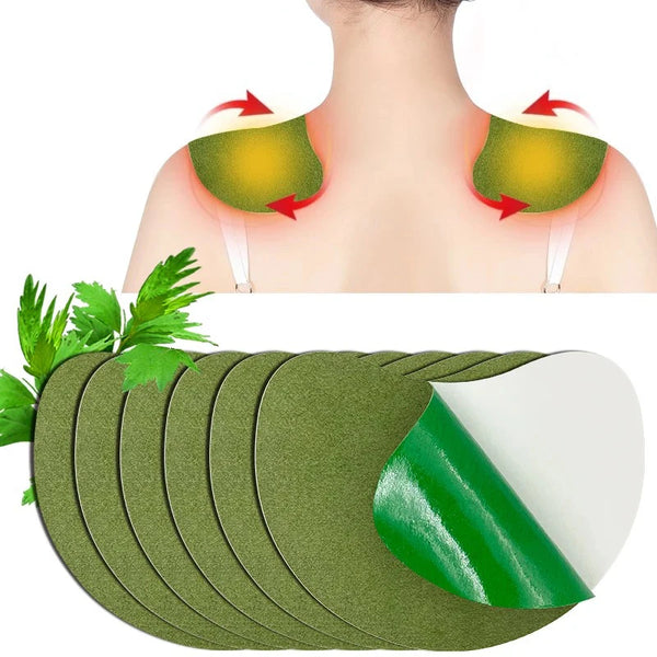 Parches de calor de acupresión en el cuello y hombro, con almohadillas verdes apiladas visibles abajo.