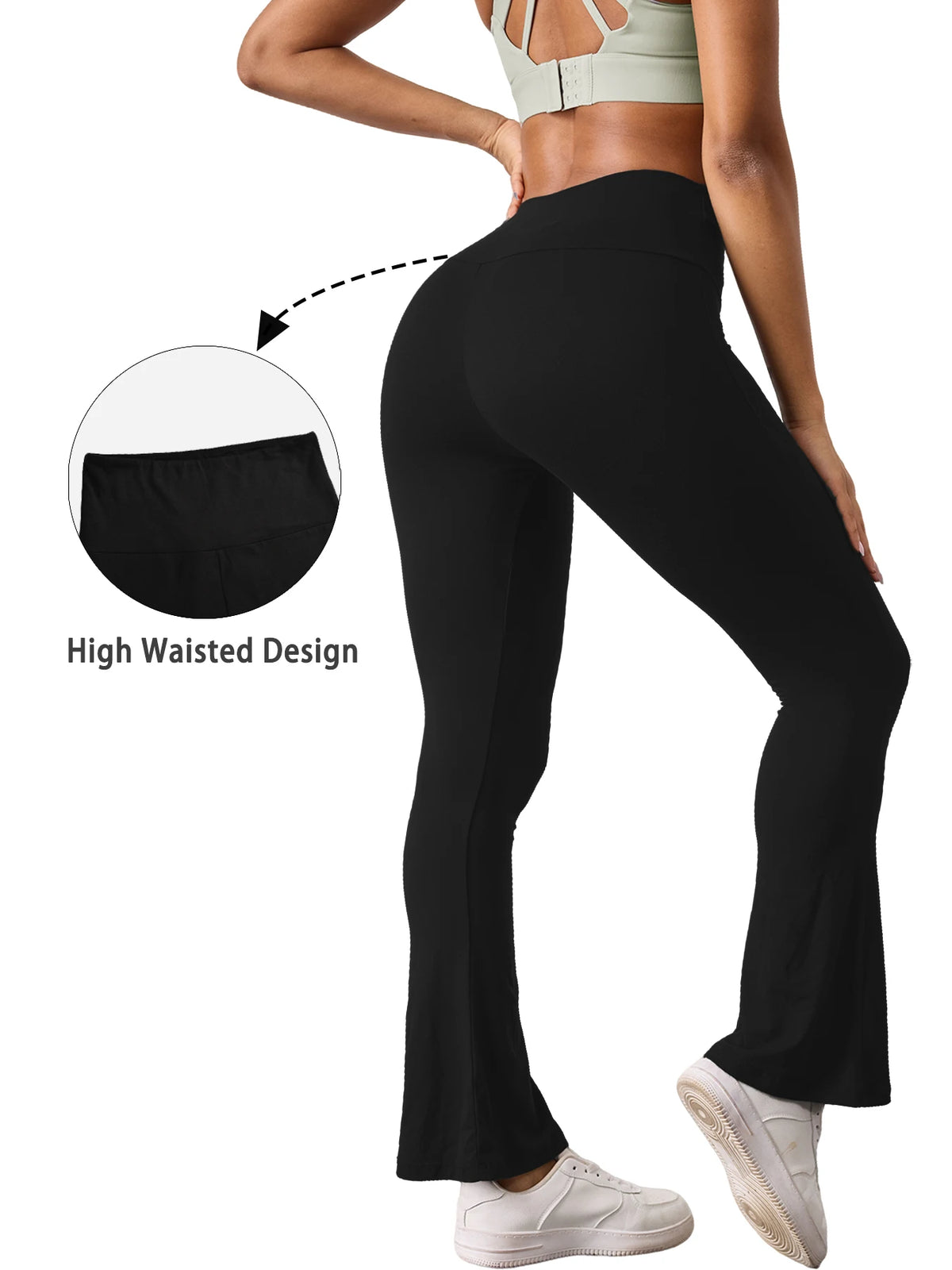 A woman wearing black flared yoga trousers and a light green sports bra, highlighting the high waisted design.