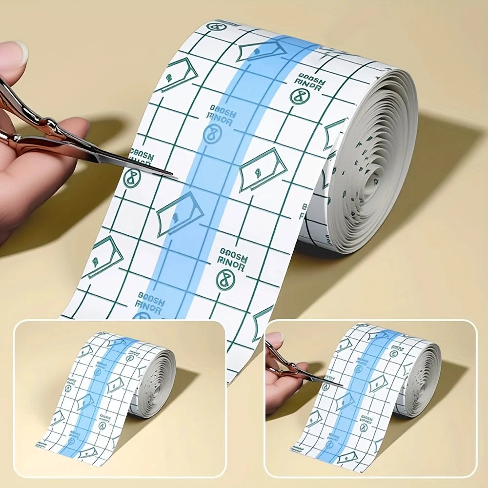 Roll of transparent self-adhesive tape with a repeating pattern for finger protection being cut by scissors