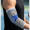 A person wearing a white and blue silicone elbow guard sleeve on their forearm.