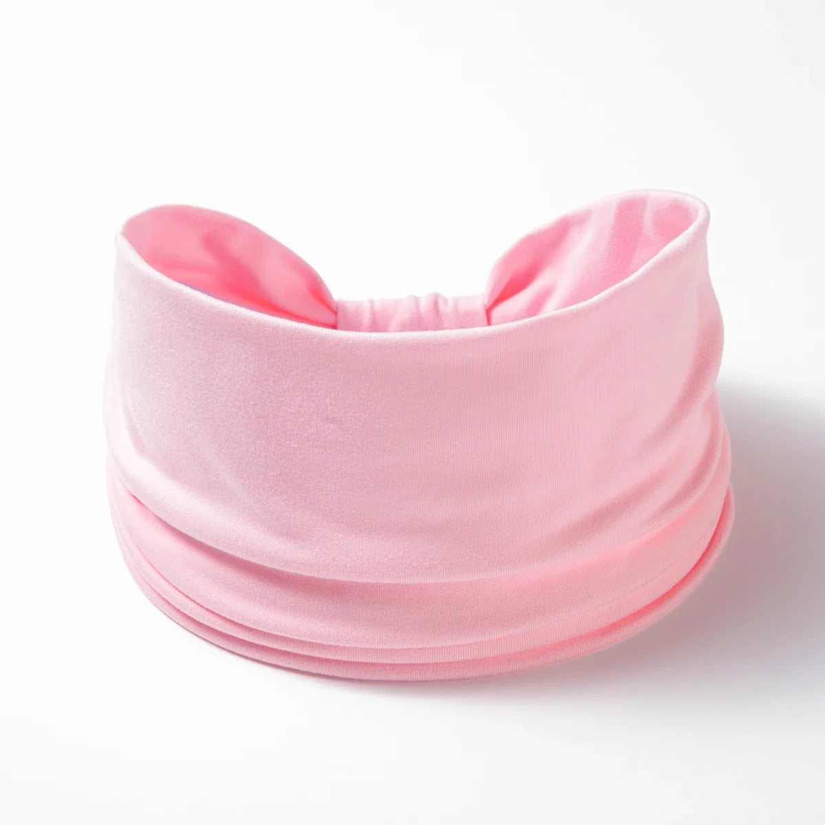 A pink boho wide headband hair wrap for women shown against a white background.