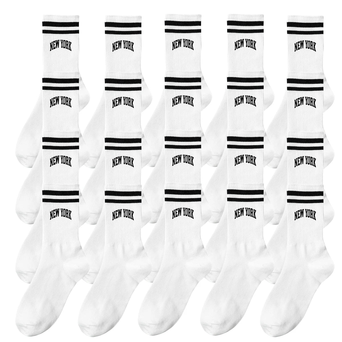 A set of white crew socks featuring black lettering that reads NEW YORK