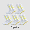 Five pairs of white and yellow anti-slip grip soccer socks displayed on a light gray background.