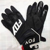 A pair of black durable motorcycle off-road riding gloves with white stitching and a brand tag.