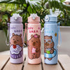 Three colorful cartoon drinking water bottles with straws in purple, pink, and blue.