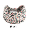 Bandeau en coton stretch à motif floral noir et blanc style bohème.