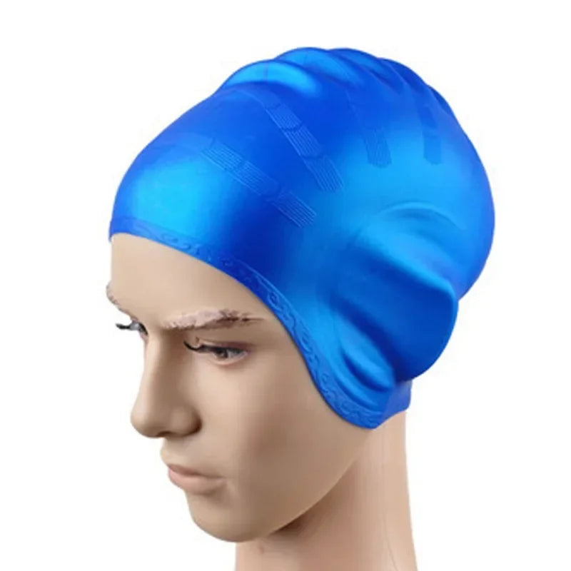 A bright blue waterproof silicone swimming cap is shown on a mannequin head.