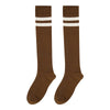 A pair of brown cotton knee high socks with white stripes