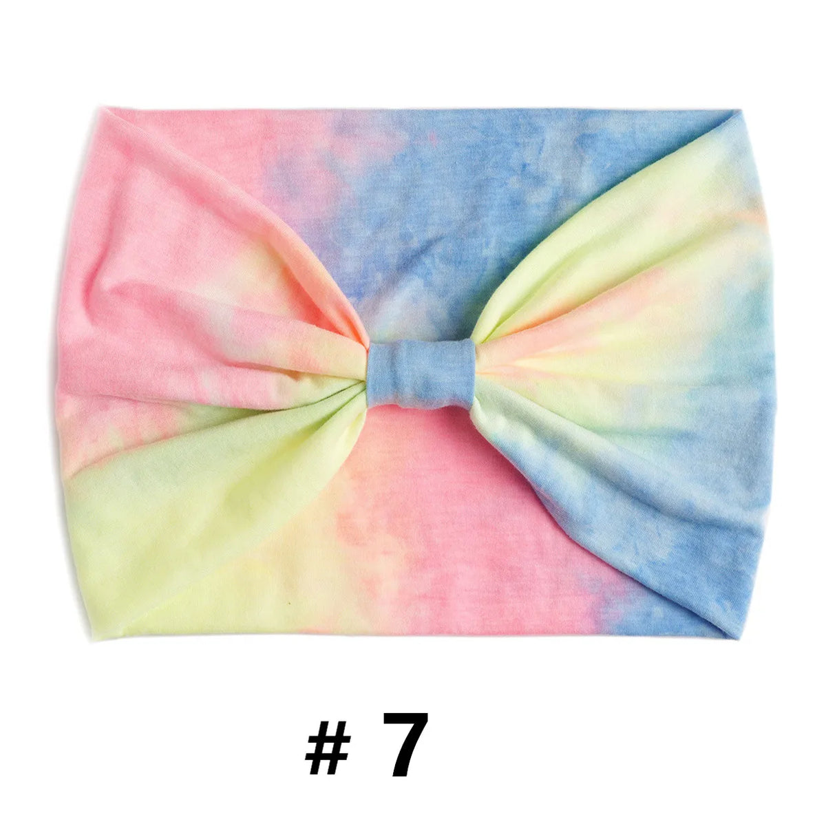 Bandeau en coton tie-dye rose et bleu noué en nœud.