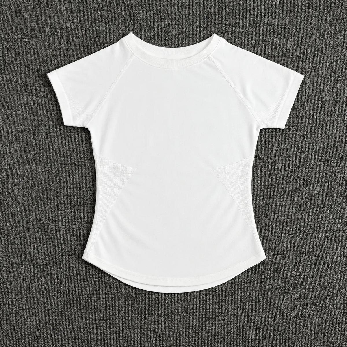 A white seamless high-waist yoga top for women displayed against a dark gray background.