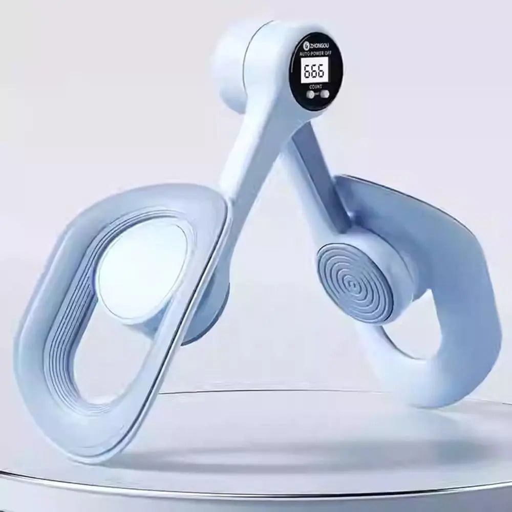 A light blue thigh and hip strength trainer with a digital display is shown in a close-up view.