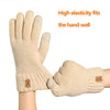 Beige knit gloves fitted to the hand, showing high elasticity for warmth and dexterity.