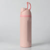 A pink insulated stainless steel water bottle with a dual drinking spout is shown standing upright.