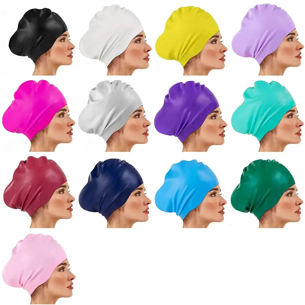 A collection of silicone swim caps in various colors including black, white, yellow, purple, pink, and green.