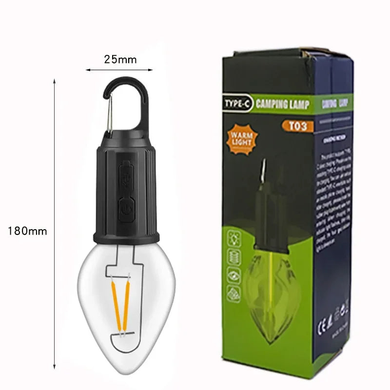 A black Type-C camping lamp with a clear bulb and packaging box shown next to it.