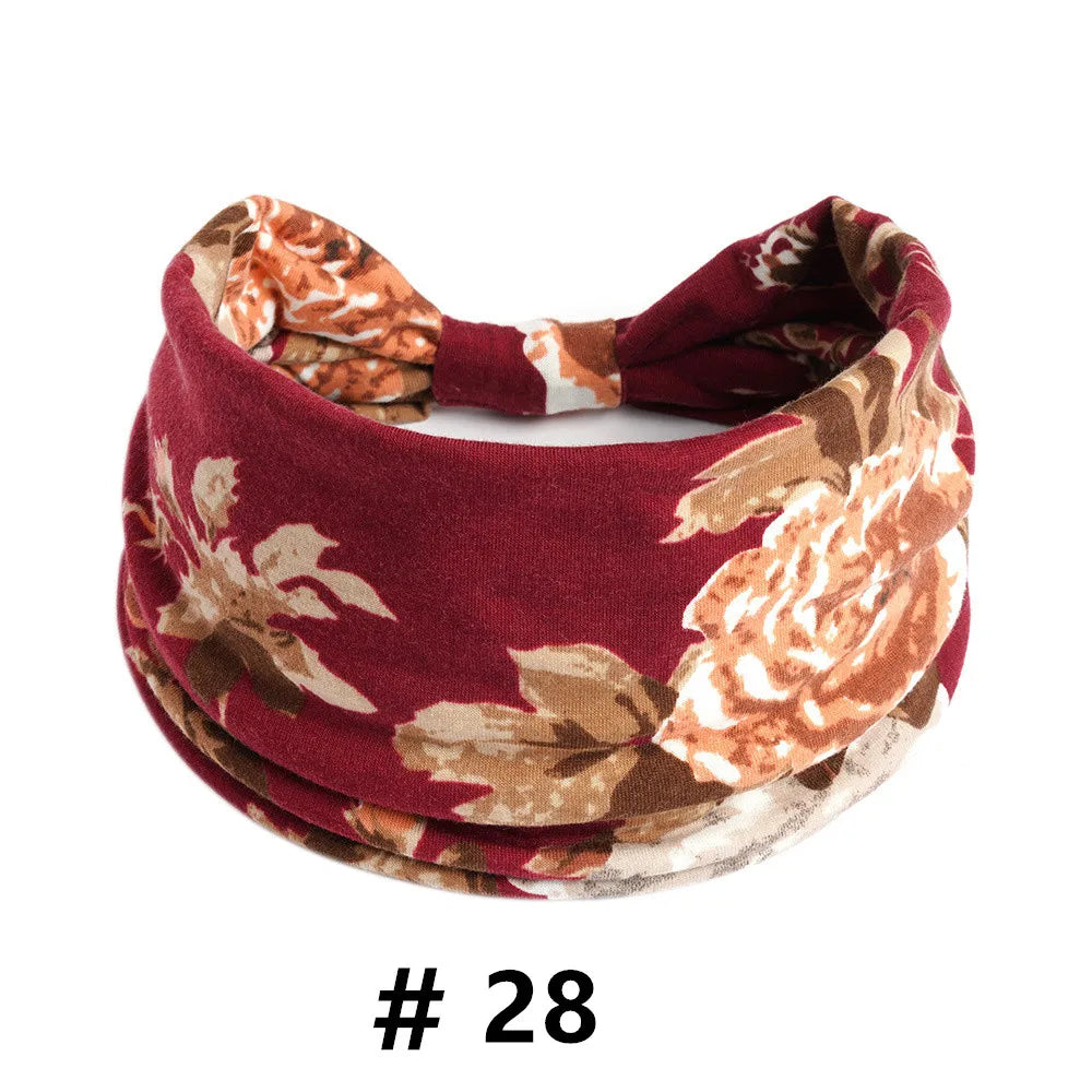 Bandeau en coton stretch à motifs floraux marron, vue à plat.