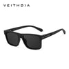 Black square sunglasses with a black frame and temple, shown against a white background.