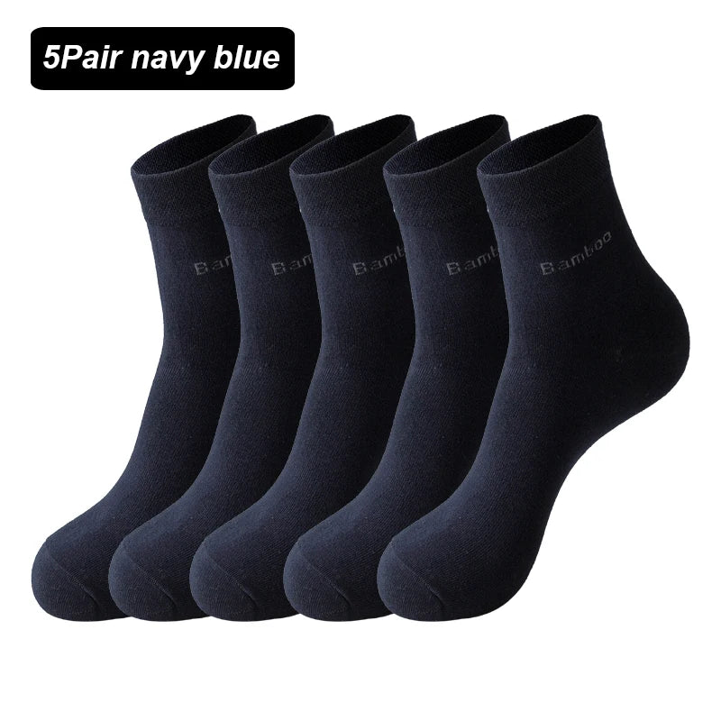 A pack of five navy blue bamboo fiber socks displayed together.