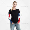 A woman models black t-shirt with blue and red UV protection arm sleeves on.