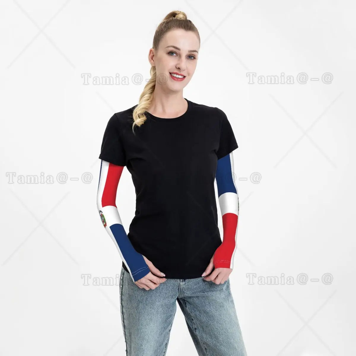 A woman models black t-shirt with blue and red UV protection arm sleeves on.