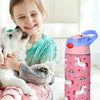 A smiling girl holds a white dog while a pink insulated stainless steel thermos cup stands beside them.
