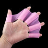Pink silicone swim training flippers wrapped around a hand