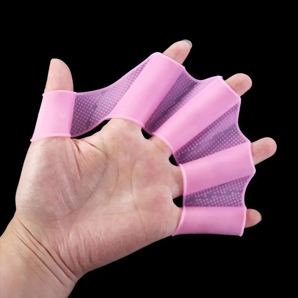 Pink silicone swim training flippers wrapped around a hand