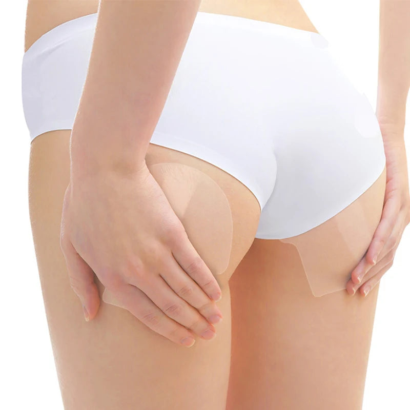 A person applying invisible body shaping patches to their thigh area.