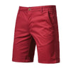 A pair of maroon men's summer cotton casual shorts.