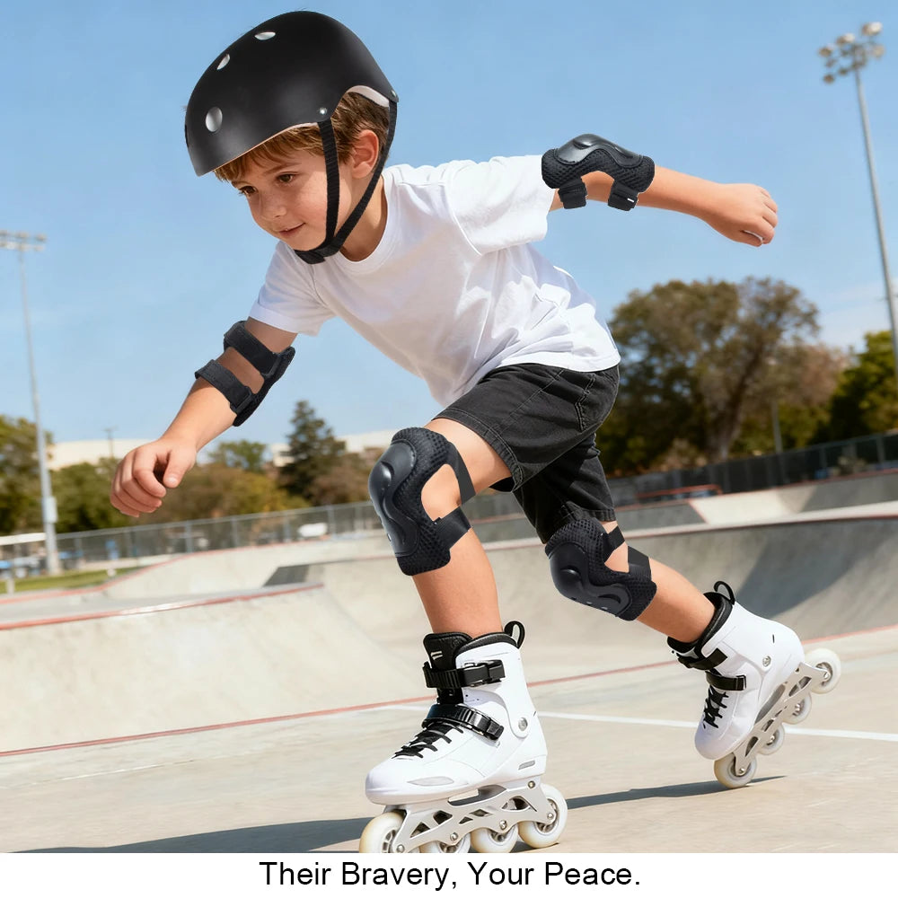 A young boy wearing a black helmet and protective gear is skating on a smooth surface.