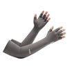 Gray UV protection arm sleeves worn on an arm, showing the hand and wrist area.