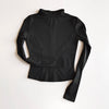 A black long-sleeved athletic jacket for yoga and fitness.
