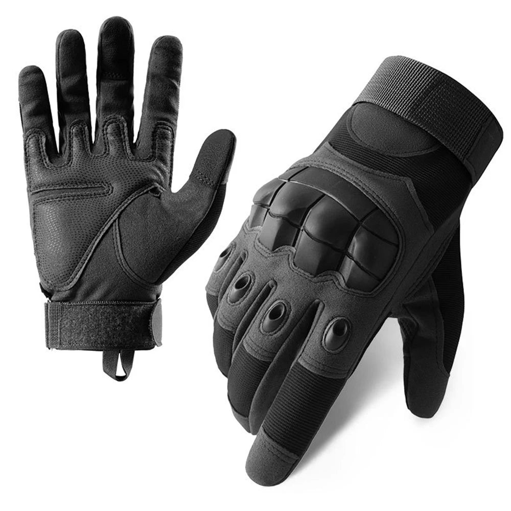 A pair of black vintage leather motorcycle riding gloves shown against a white background.