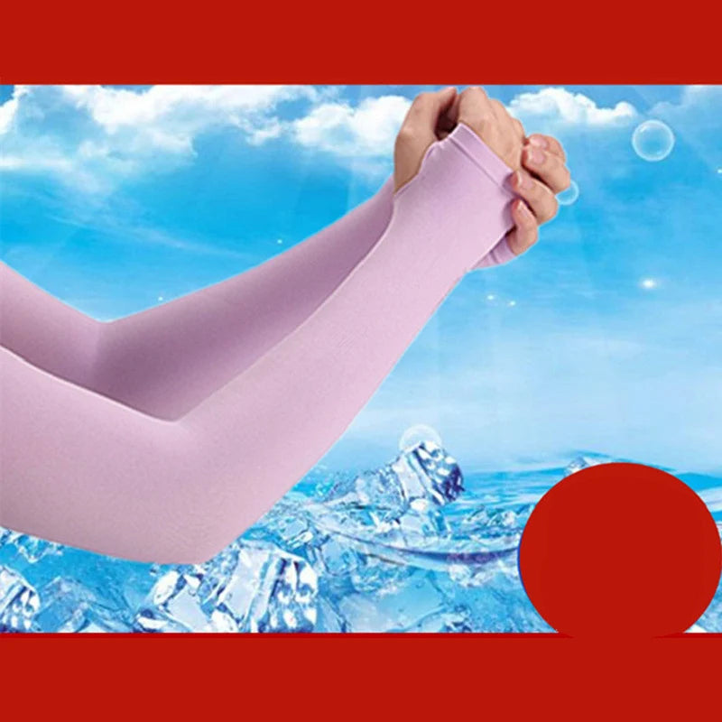 A person wearing a light pink ice silk arm sleeve against a bright blue sky and icy landscape.