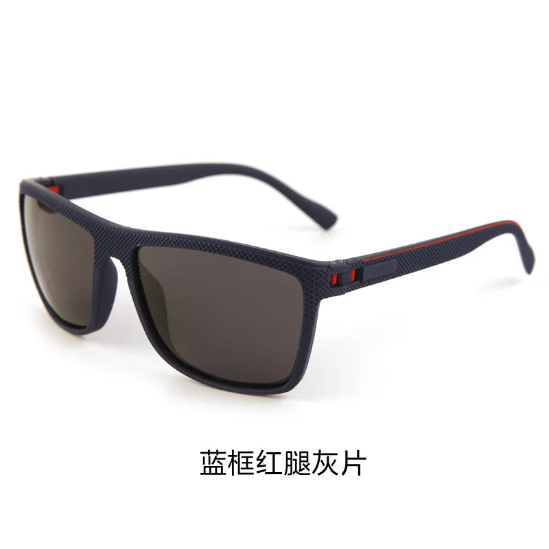 A pair of dark blue square sunglasses with an orange trim and a black frame.