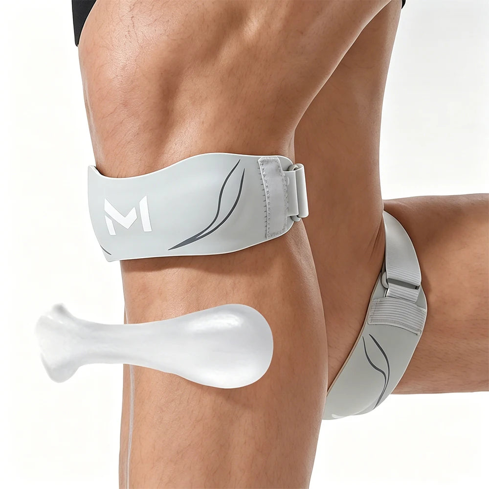 A person's knee wearing a light gray adjustable patellar tendon support knee brace.