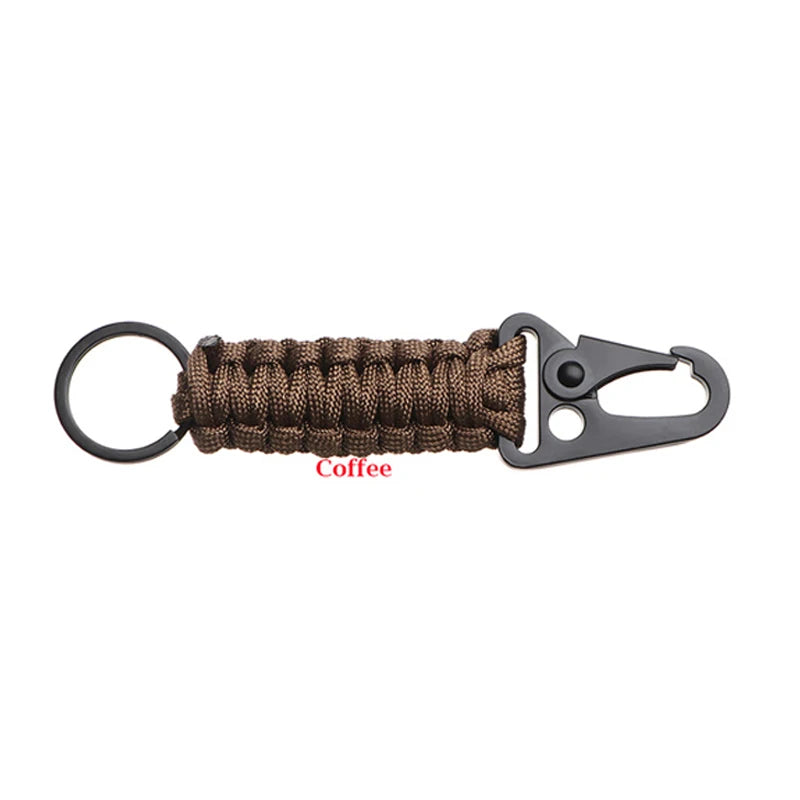 A brown braided cord multi-tool keychain with a metal clasp.