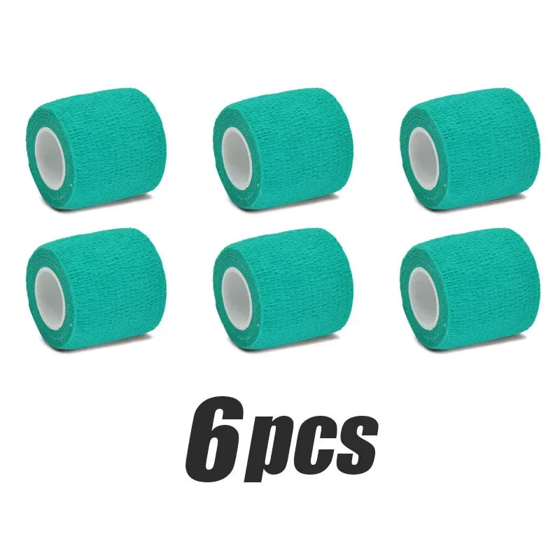 Six rolls of teal elastic tattoo grip tape for finger and wrist protection.