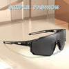A pair of black sunglasses with a square frame and gold detailing are displayed on a light surface.