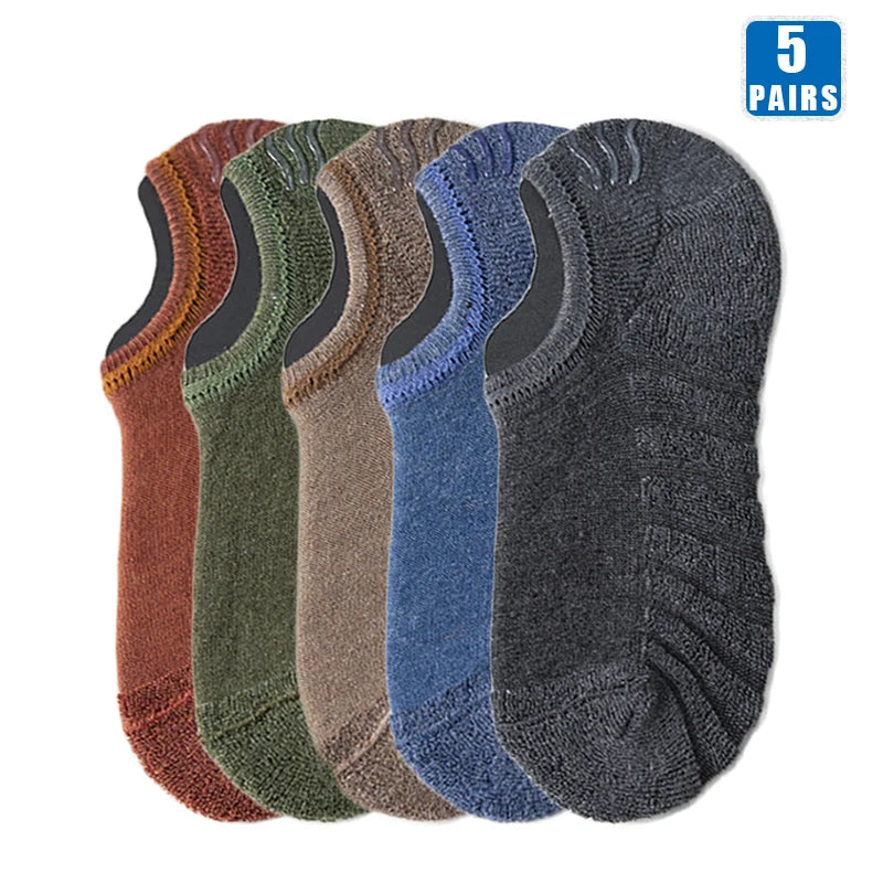 Five pairs of men's cotton crew socks in various earth tones and blues.