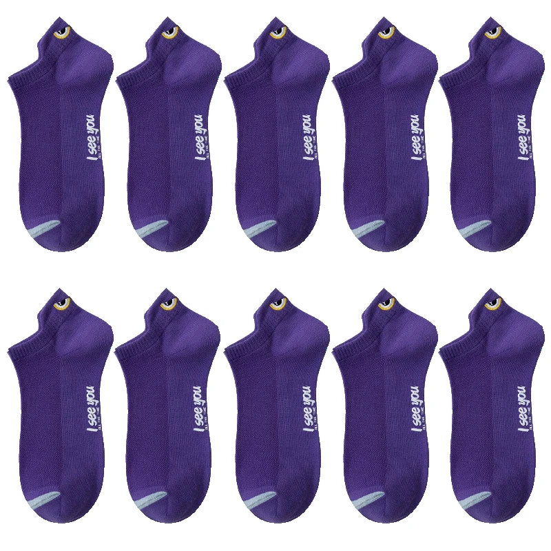 A set of purple men's breathable ankle boat socks displayed in various folds and angles.