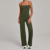A woman wearing a olive green high-waist yoga and fitness tracksuit set.
